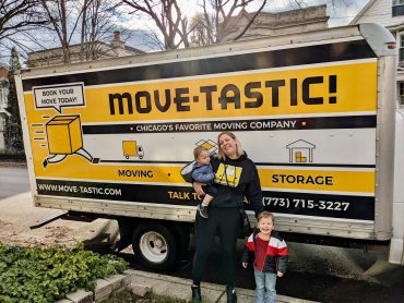 Moving with kids near a moving truck