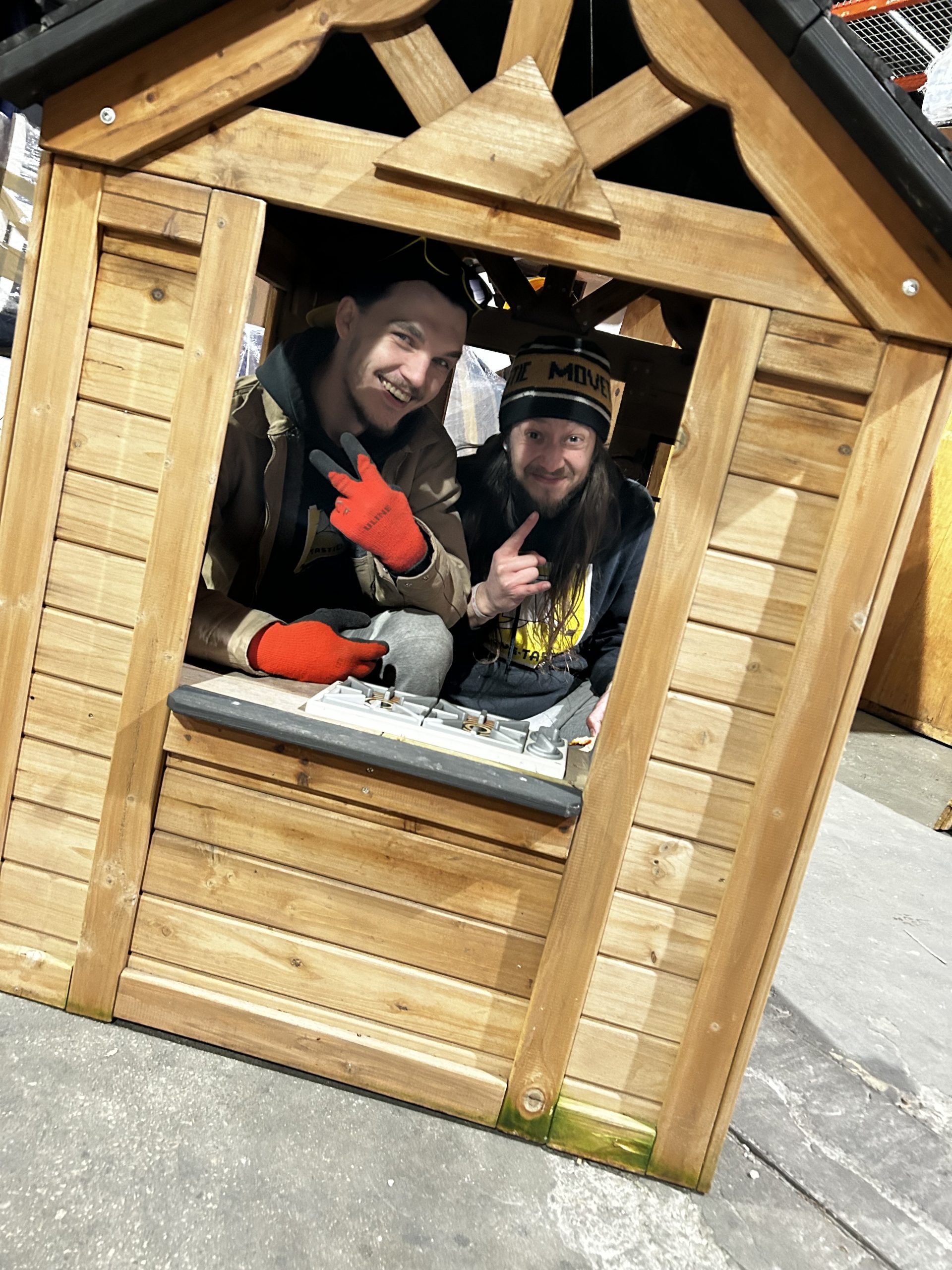 Movers inside a playhouse