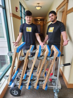 Movers ready to load PODS for moving.