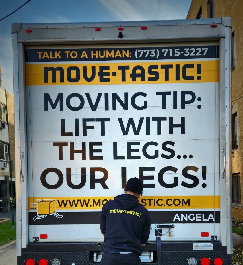 Reliable long-distance movers prepping truck